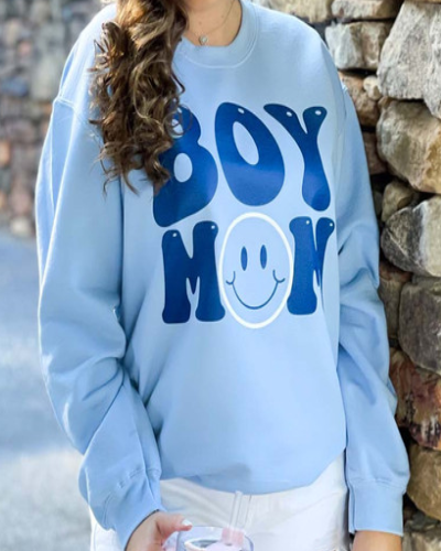 Boy Mom" Graphic Sweatshirt, a cozy and stylish sweatshirt celebrating the joys and adventures of being a mom to boys.
