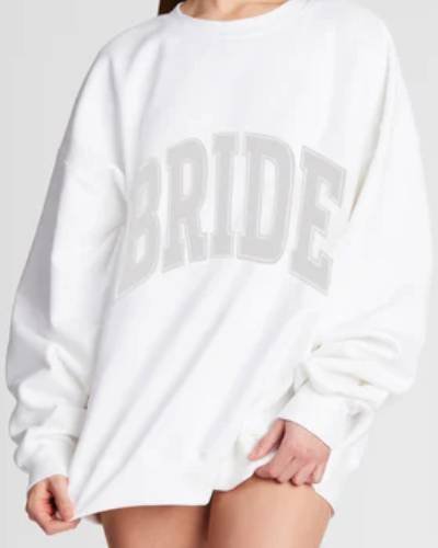 White sweatshirt with 'Bride' print, a stylish choice for soon-to-be-married individuals celebrating.