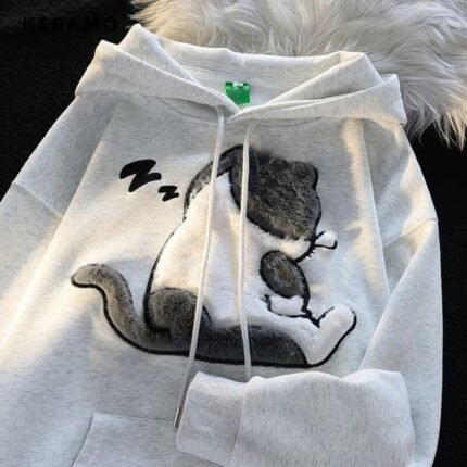 A fluffy sleeping cute cat hoodie, shown from the back side view, adorable and cosy.