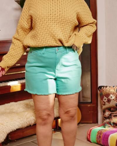 Brandy Aquamarine Fray Hem Shorts in plus size - Trendy, colorful, and comfortable for confident summer styling.