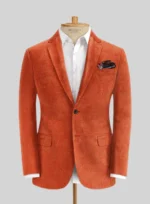 Warm up your style with a burnt orange corduroy jacket, a cozy and trendy essential.