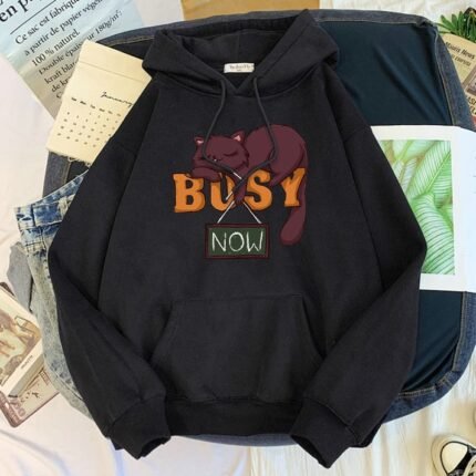 A charming brown cat hoodie with a cute design, perfect for those feeling busy and playful.