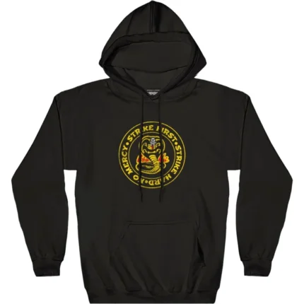 Cobra Kai Strike First Mantra Hoodie, a bold and empowering statement inspired by the series.