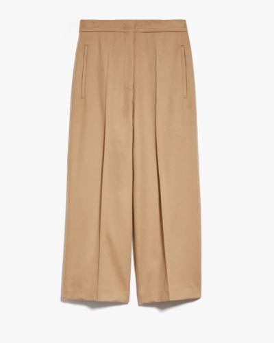 Embrace modern sophistication with these Brown Cropped Wool Trousers. The cropped length and rich brown hue make these trousers a stylish and versatile addition to your wardrobe, offering a contemporary and chic look.
