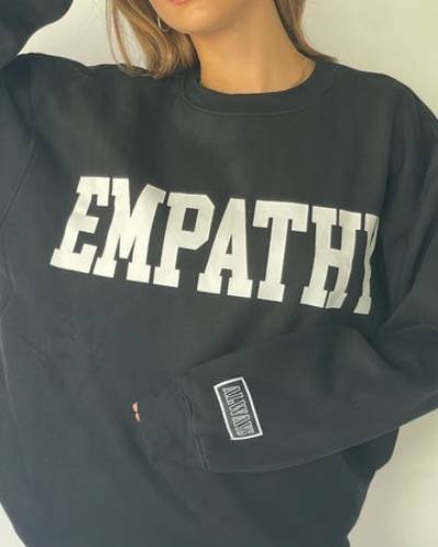 Empathy Always Black Crewneck - A classic and timeless crewneck spreading the message of empathy, because kindness never goes out of style.