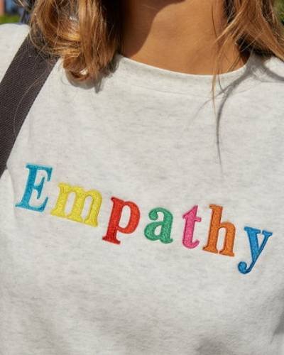 Empathy Always Grey Crewneck - A versatile and comfortable grey crewneck spreading the message of empathy, because kindness is timeless.