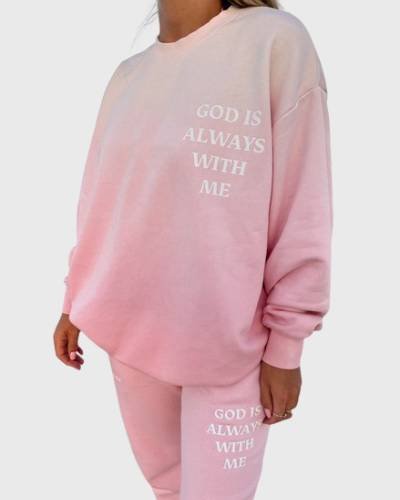 God Is Always With Me Pink Unisex Crewneck: Embrace faith and style with this pink unisex crewneck, featuring a comforting message for a fashionable and inspirational look.