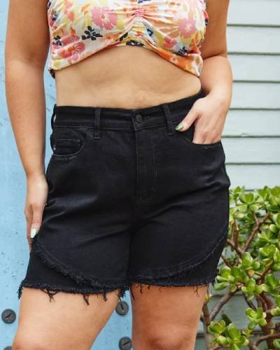 Kaya Frayed Tulip Hem Black Shorts - A chic and versatile addition for trendy casual outfits.