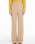 Elevate your style with these Long Wool Crepe Trousers, a sophisticated and versatile wardrobe staple. Featuring a sleek design and luxurious wool crepe fabric, these trousers offer an elegant and timeless option for a polished and chic look.