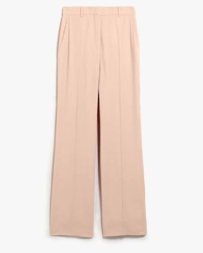 Elevate your wardrobe with these Long Wool Crepe Trousers, a perfect blend of sophistication and comfort. The trousers feature a sleek design in luxurious wool crepe, providing a versatile and stylish option for a modern and chic look.