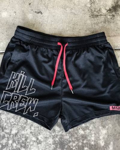 Muay Thai Shorts with mid-thigh cut in classic black - a sleek and versatile choice for training.