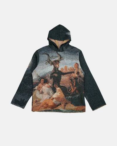 A mystical Goya-inspired tapestry hoodie featuring witches dancing under the moonlight, invoking ancient magic.