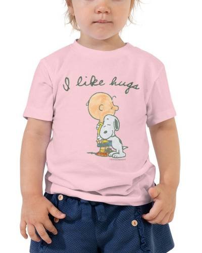 Snoopy I Like Hugs Toddler T-Shirt: Wrap your little one in sweetness with this toddler-sized tee featuring Snoopy expressing a love for hugs.