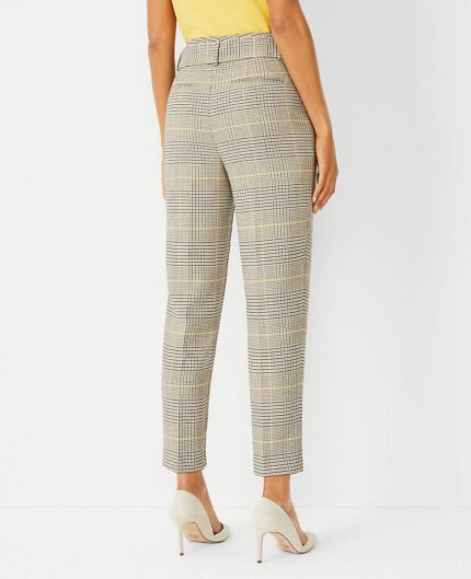 The Petite Belted High Waist Taper Pant in Glen Check," a stylish and tailored pair of petite pants featuring a high waist, tapered silhouette, and a Glen Check pattern for a sophisticated and on-trend look.