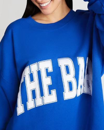 Cobalt varsity-style sweatshirt, perfect for a sporty and stylish addition to your wardrobe.