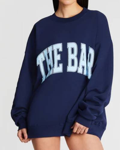 Navy and baby blue varsity-style sweatshirt, combining classic colors for a timeless look.