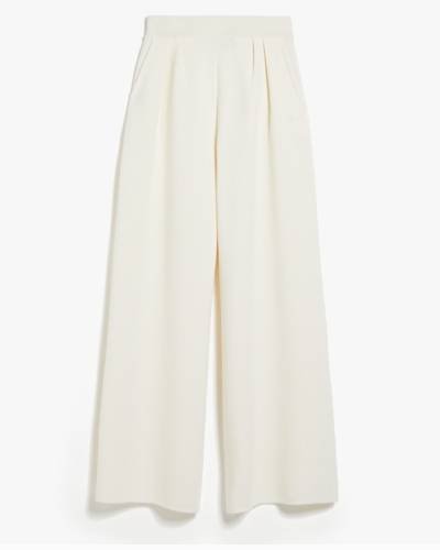 Embrace a timeless and elegant look with these Wide-Leg Wool Trousers. The trousers feature a classic wide-leg silhouette in luxurious wool, offering a versatile and sophisticated addition to your wardrobe for a chic and polished style.