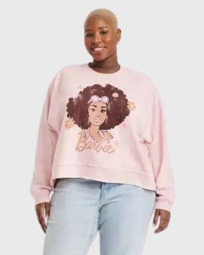 Pink women's sweatshirt featuring Afro Barbie graphic, a stylish nod to diversity and empowerment.