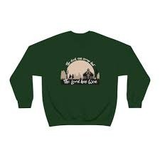 Green 'The Lord Has Won' sweatshirt by Zach Bryan, a stylish expression of faith and fashion.